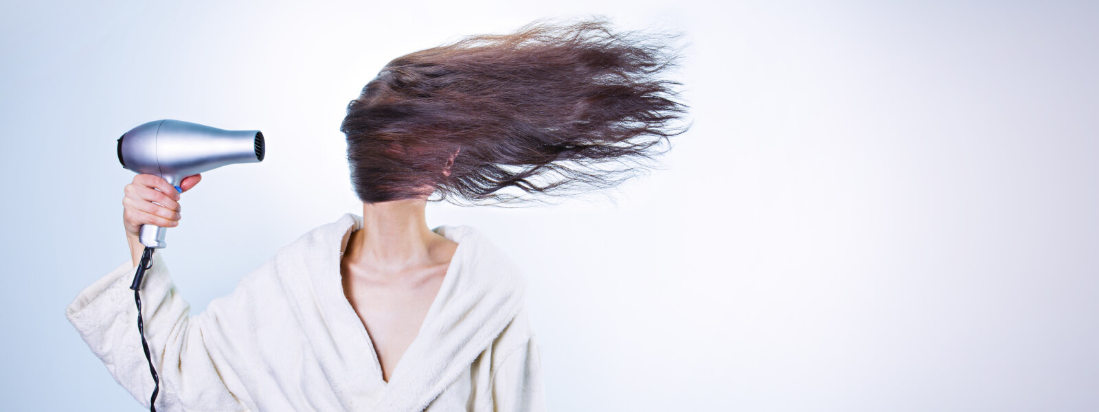 girls hair blowing in the wind self care increase productivity and prevent burnout