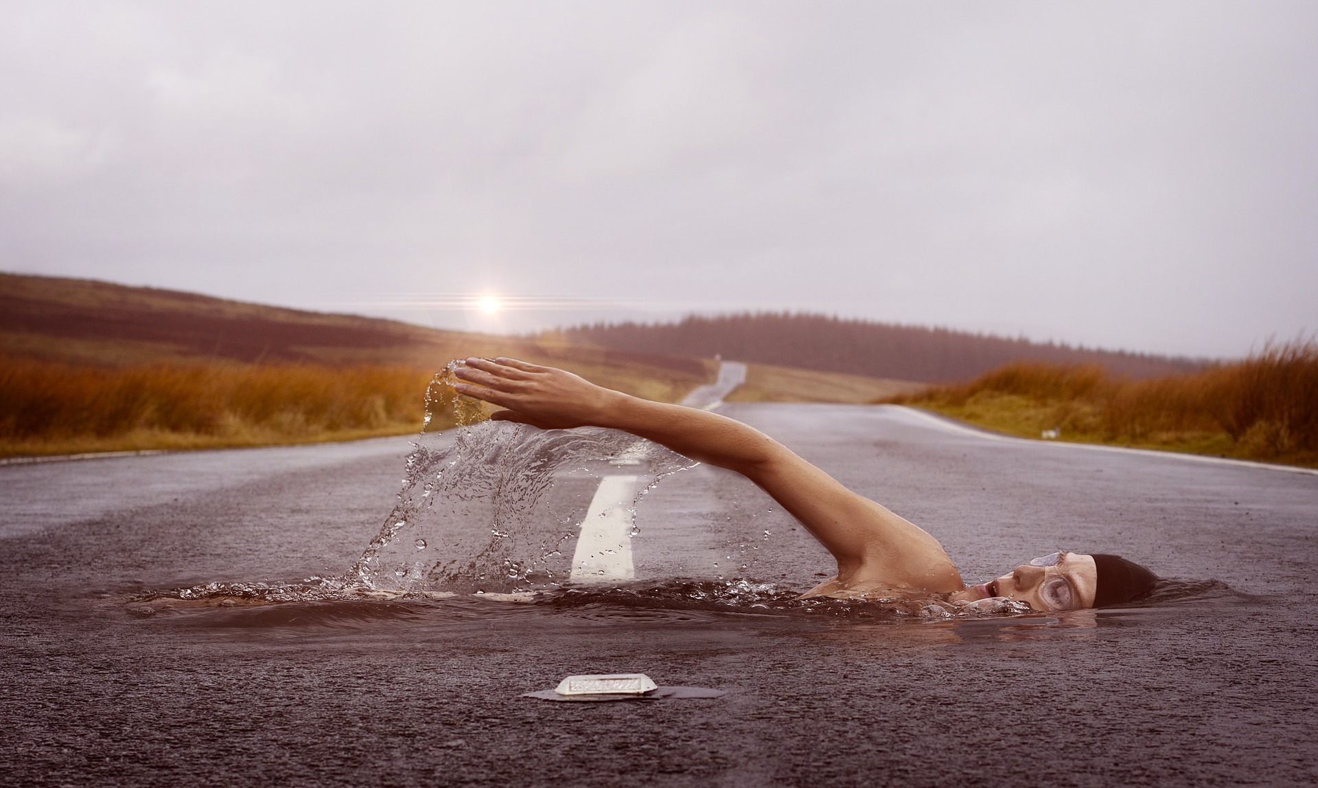 male swimming on pool middle of street running or swimming which is better for you