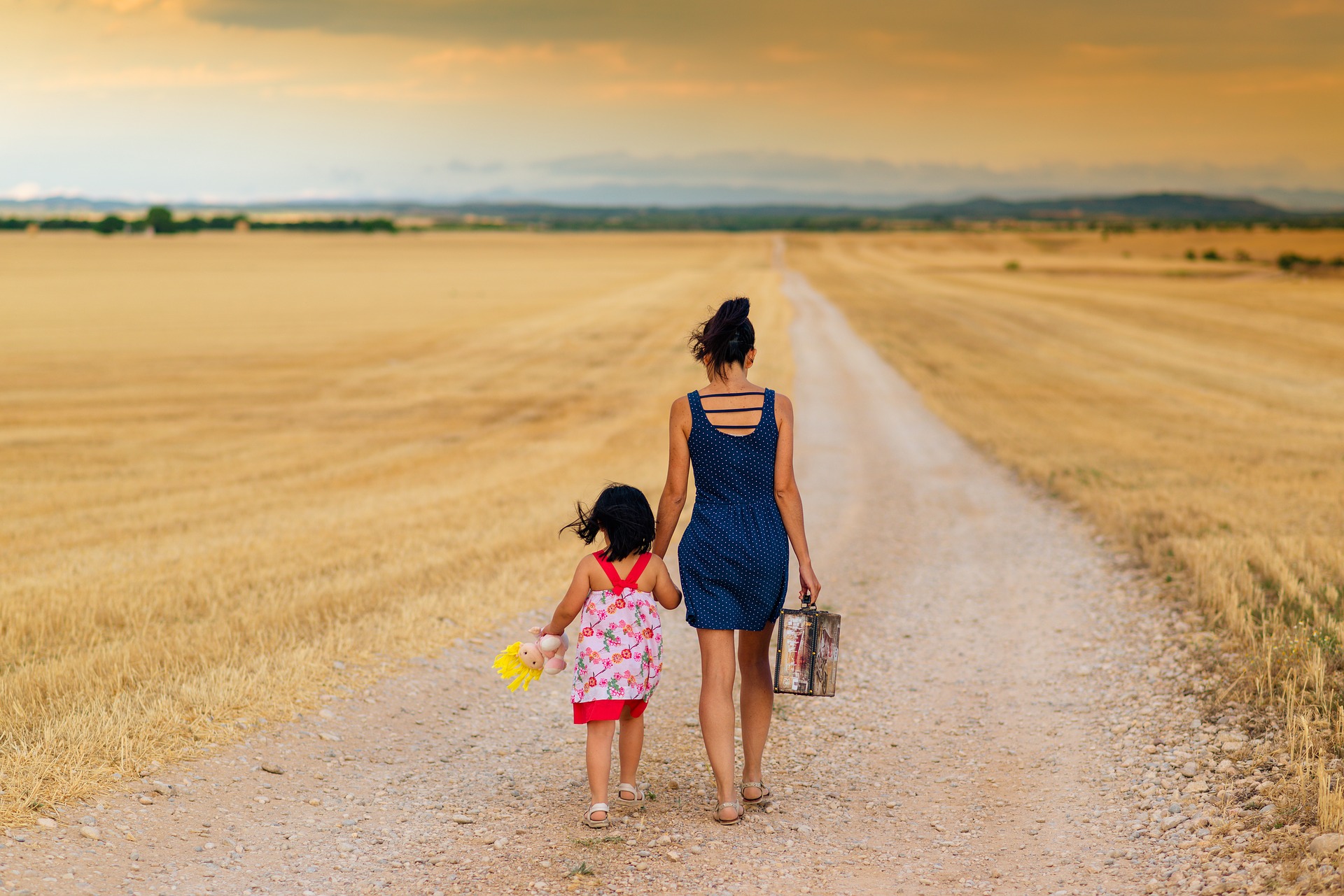 mother and child walking on a road parent shaming degrade mothers health