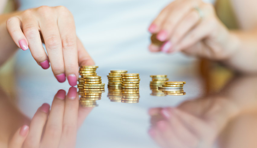Woman counting coins